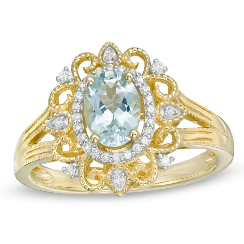 Oval Aquamarine 1/10 CT. T.W.Diamond Frame Vintage-Style Ornate Ring in 10K Gold - Picture 1 of 7
